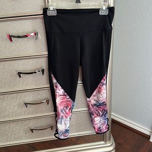 Size medium floral with crisscross mesh design black leggings